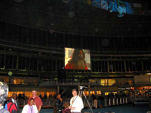 Swamiji on the big screen during presentation