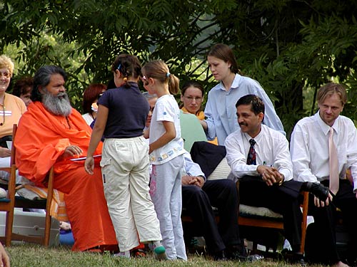 Children are greeting Swamiji