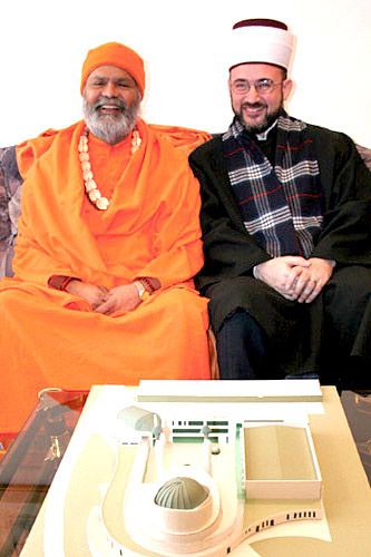 His Holiness Swamiji with Mufti Osman Djogic (in front of them is a model of a new Muslim centre that is going to be built in Ljubljana)