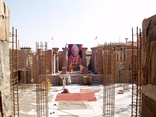 The photo is so large one can actually see it from the main gate of the Ashram